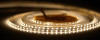 Лента  5х5000мм, SMD 2835, 24В, теплый,  9.6 Вт/м, 120 диодов/м, 1 350 Лм/м, IP20, AQ